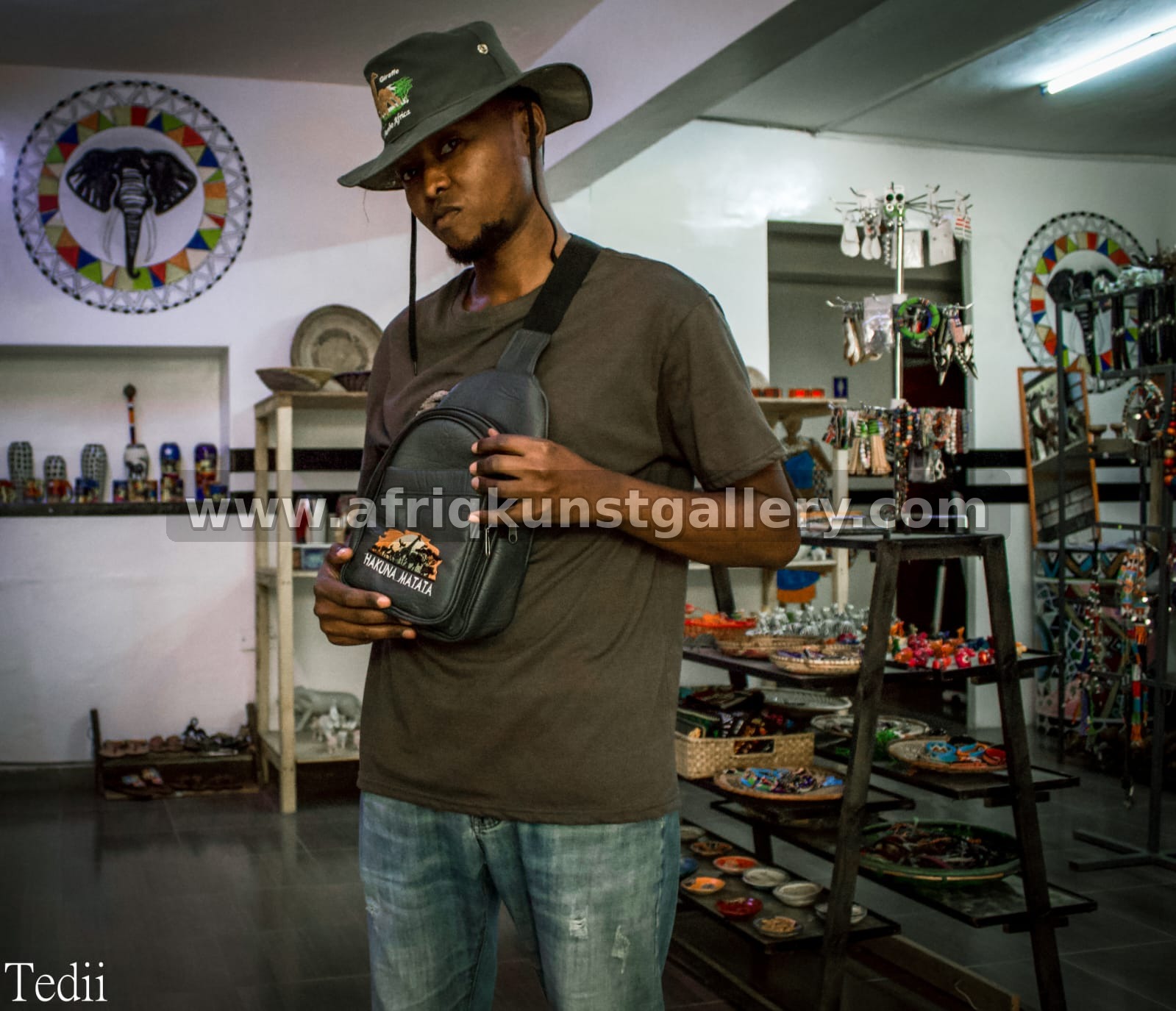 Safari-inspired bag and hat styling in a Nairobi lifestyle scene.