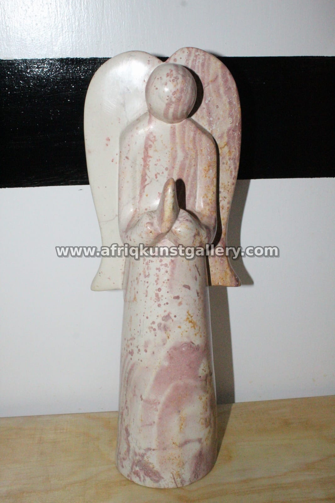 Pink Soapstone Thinking Figure.