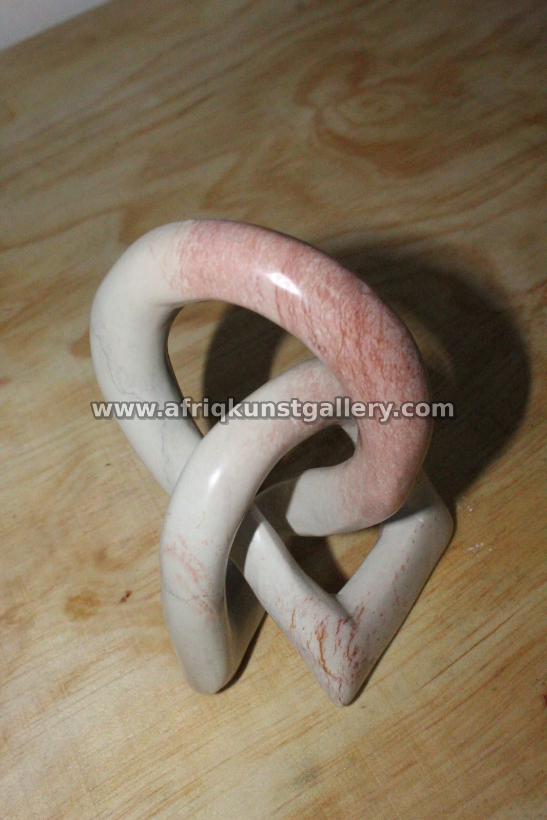 Pink & White Soapstone Loop Knot Sculpture.