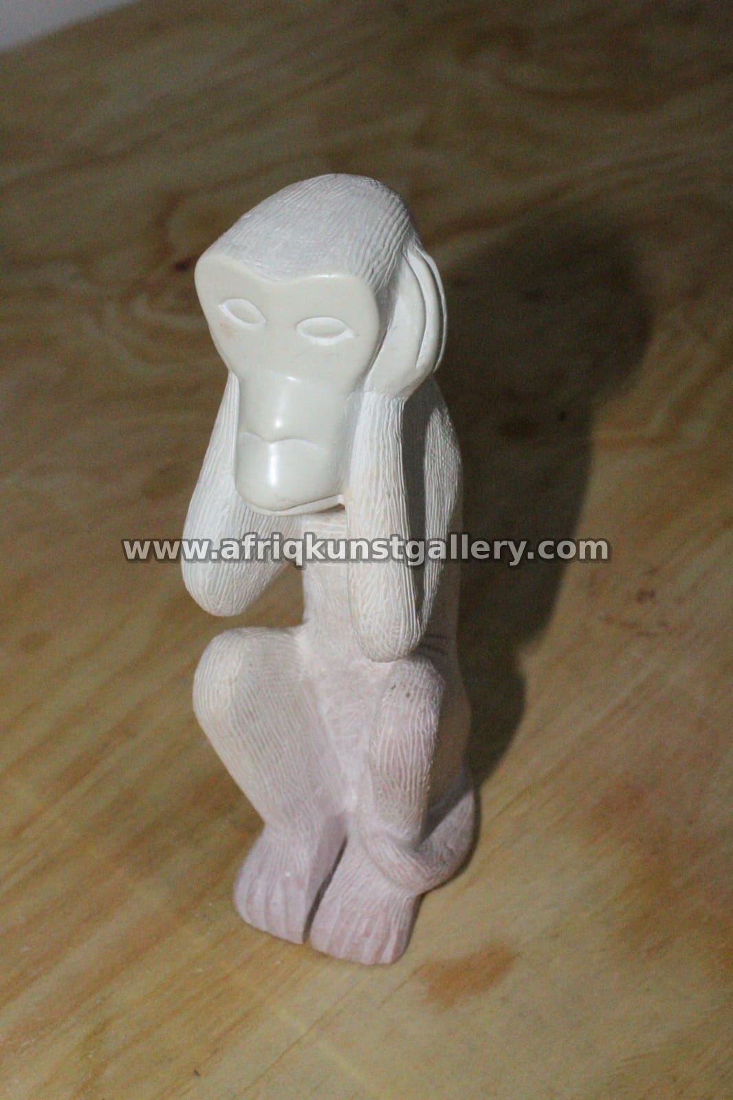 White Soapstone Thinking Figure.