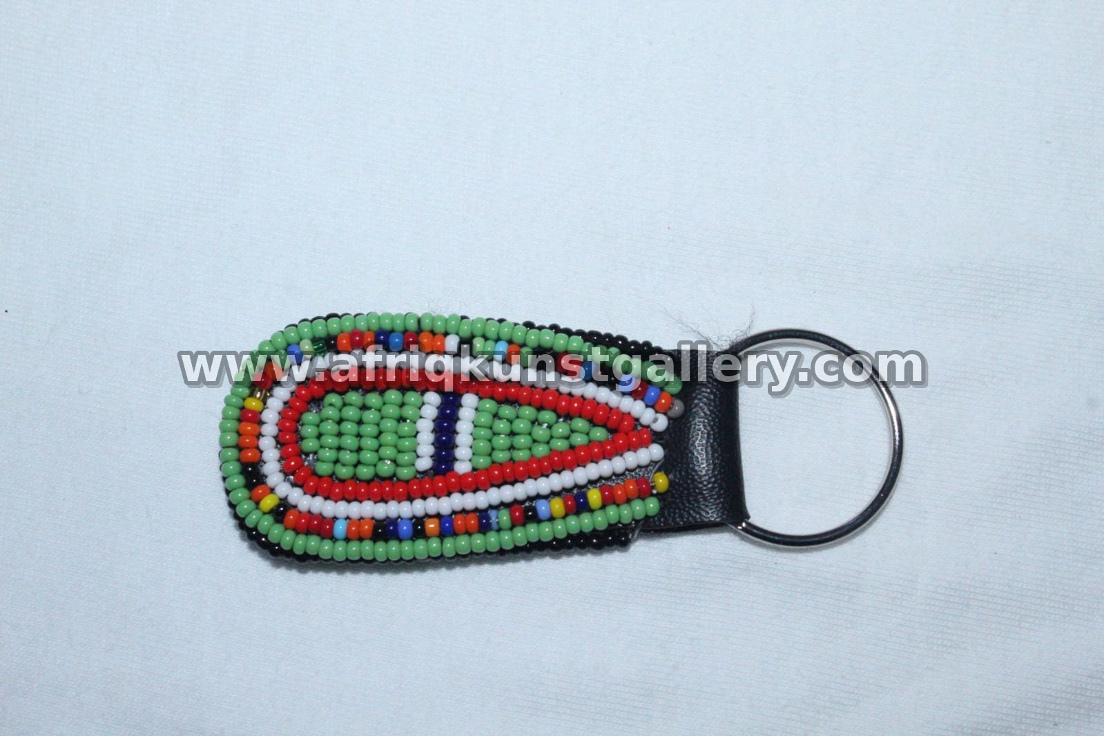 Beaded Shield Keyholder handmade African keyholder with artisan detail.