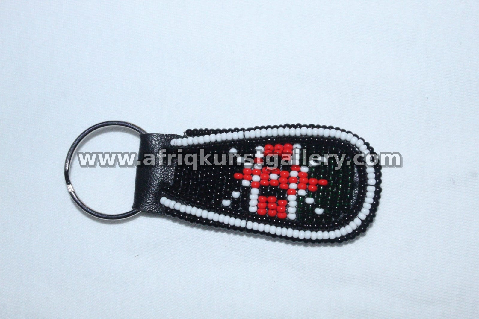 Beaded Shield Keyholder handmade African keyholder with artisan detail.