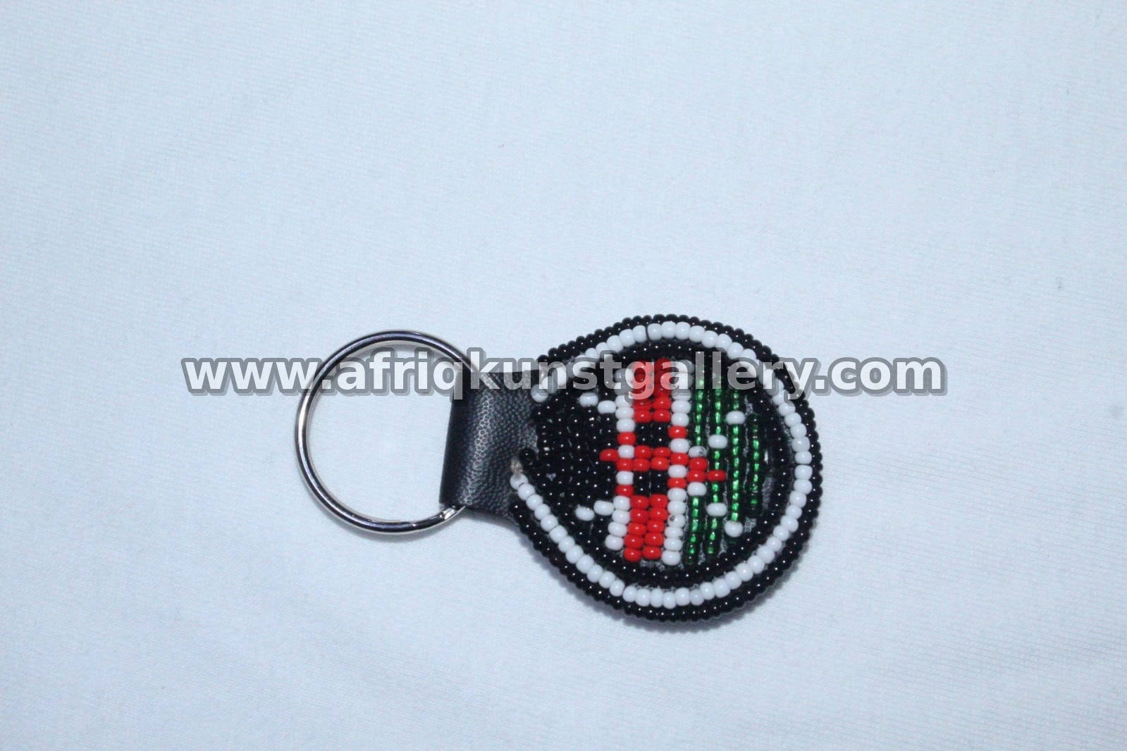 Beaded Shield Keyholder handmade African keyholder with artisan detail.