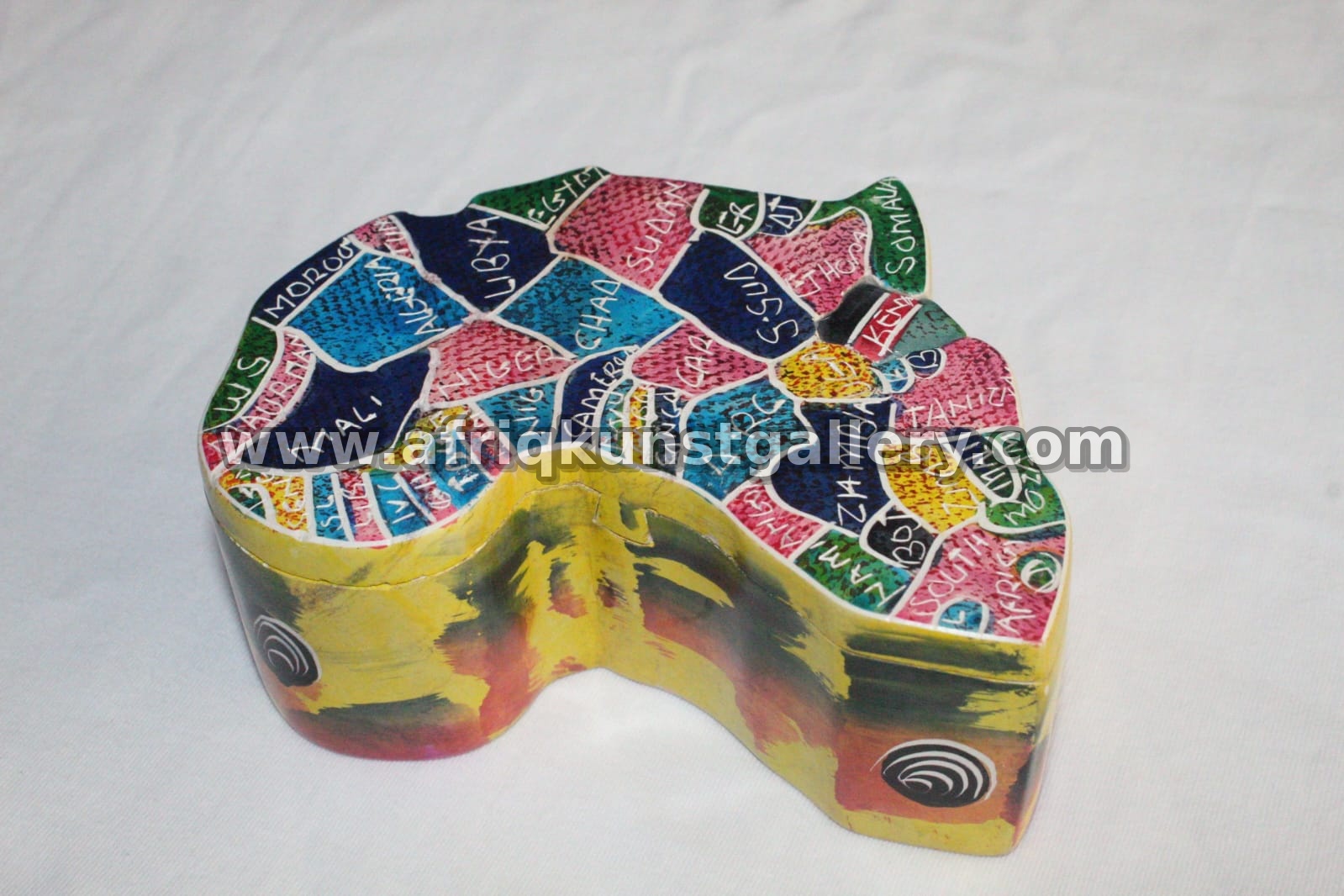 Africa-shaped keepsake box with colorful painted panels.