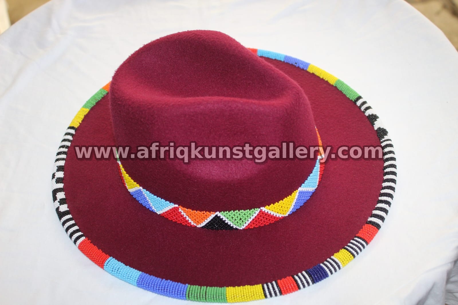 Kenya beaded fedora hat with Maasai-inspired beadwork in multiple color options.