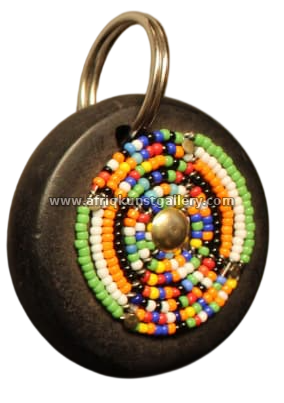Round beaded keyholder with multicolor confetti beadwork.