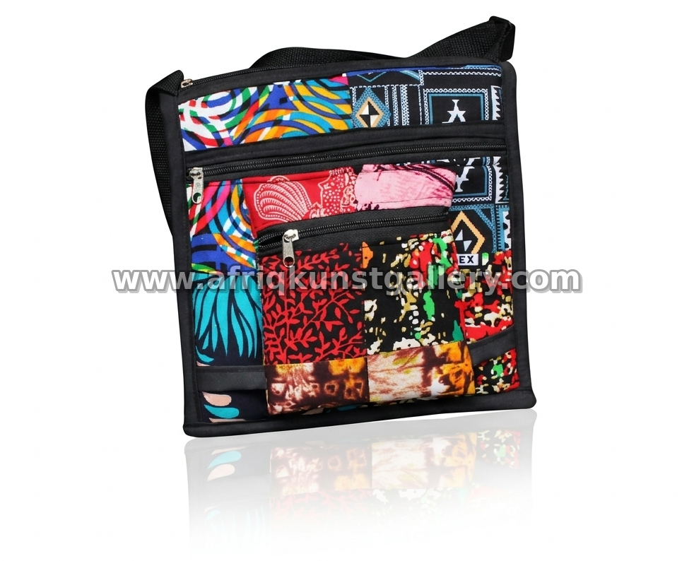 Patchwork crossbody bag with multiple zip pockets and colorful textile panels.