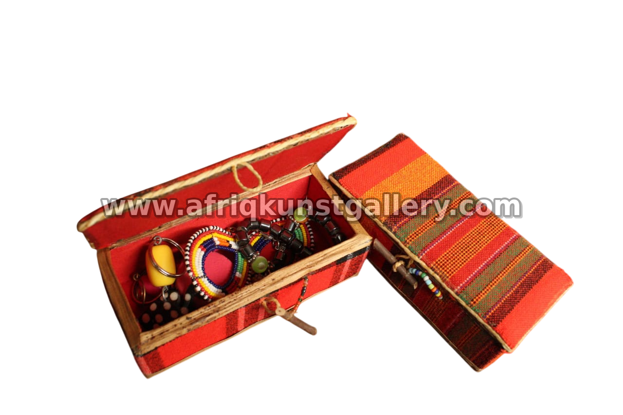 Textile-covered jewelry box with a red interior.