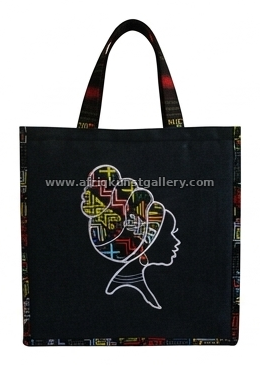 Black tote bag with an Africa profile illustration on a white background.