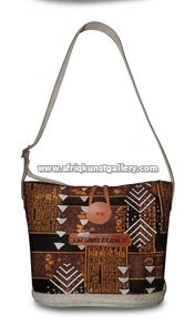 Brown tribal crossbody bag on a white background.