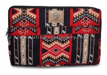 Red tribal laptop sleeve on a white background.