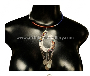 White teardrop beaded pendant necklace on a white background.