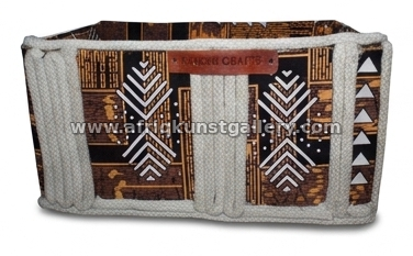 Woven trim storage basket on a white background.